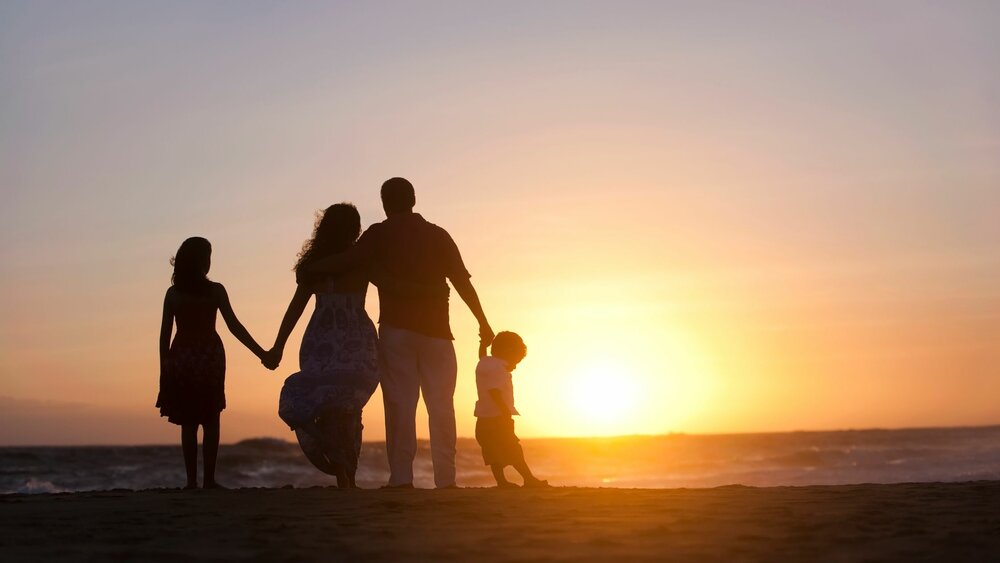 Family Watching the Sunset